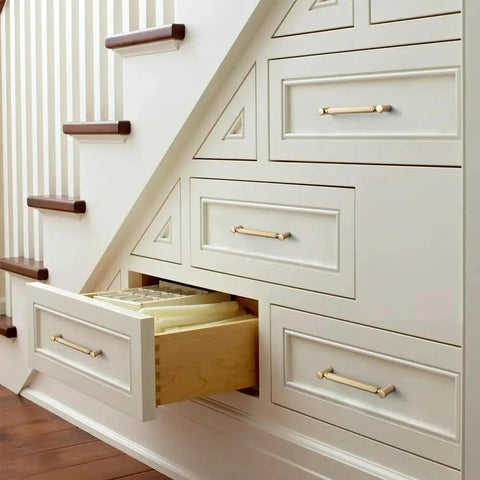 6 Pack 5 Inch Center To Center Knurled Cabinet Pulls In Champagne Bronze with circular end caps on wooden stairway drawers