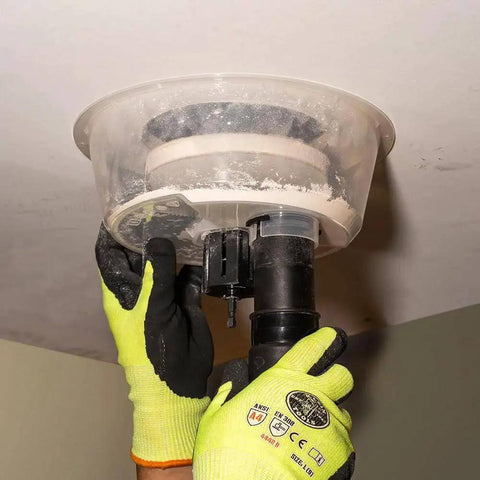 Pro Grade Adjustable Hole Saw Cutter For Drywall And Ceiling Tiles With Dust Bowl And Vacuum Port, 2 To 7 Inches in use, installed on ceiling