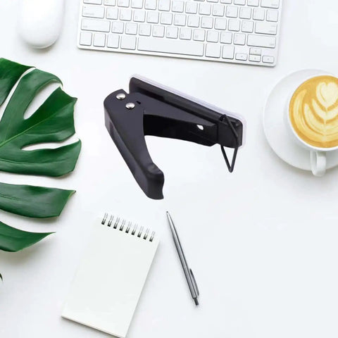 One Quarter Inch Hole Puncher With 20 Sheets Capacity Ergonomic Grip Easy Handheld Metal Paper Punch on desk with office supplies