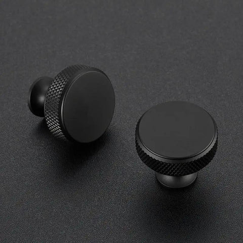 Round Matte Black Knobs And Knurled Single Hole Pulls, solid metal cabinet hardware, front view, durable finish by Ravinte