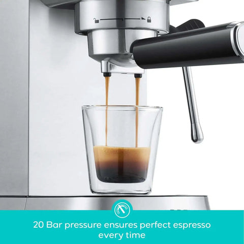 Close-up of Compact 20 Bar Espresso Machine With Steam Milk Frother, showing espresso being brewed into a glass.