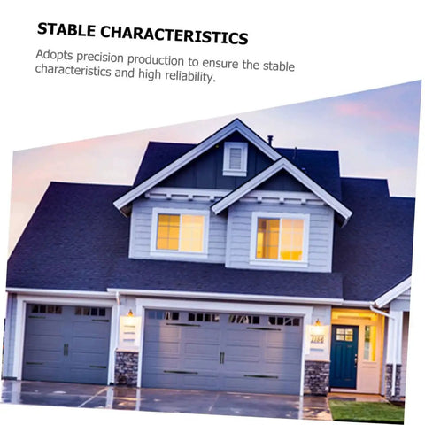 Modern home with two gray garage doors, showcasing premium door hinges set for garage and shed built to last Gatuida heavy duty construction.