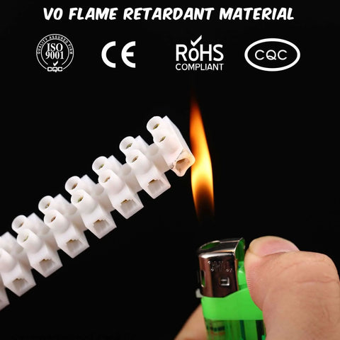 12-Position Dual Row White Screw Terminal Block Set 10 A 380 V Wire Connector electrical barrier block shown near flame.