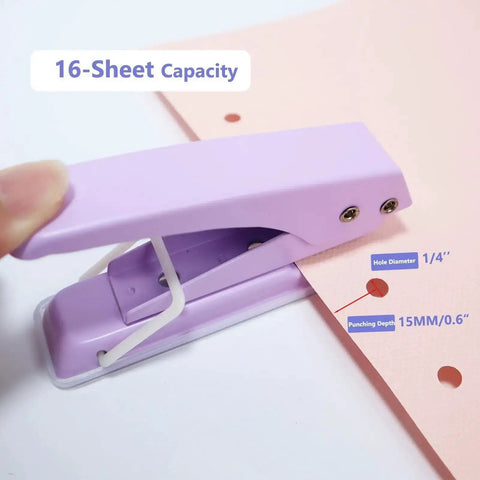Heavy Duty Quarter Inch Hole Puncher For Paper And Crafts, handheld, 16 sheet capacity, showing lever action on pink paper