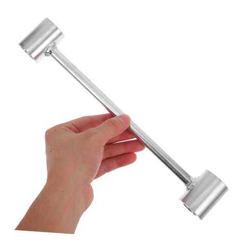 Pro Grade Adjustable Hinge Wrench For Heavy Duty Doors And Furniture, ergonomic tool held by hand, showing metal construction.