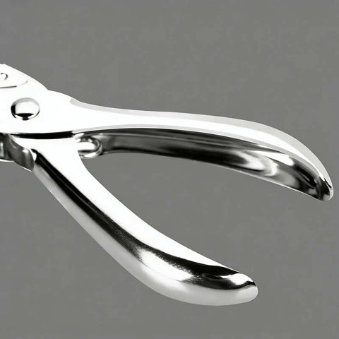 Close-up of Two Pack Single Hole Puncher Metal Craft Hole Punch For Scrapbooking And Tickets 6 mm Hole Diameter handle