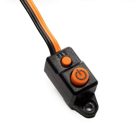 Close-up of power switch from the 85A Brushless Smart ESC And 4000Kv Sensorless Motor Combo For RC Cars And Trucks, Plug And Play