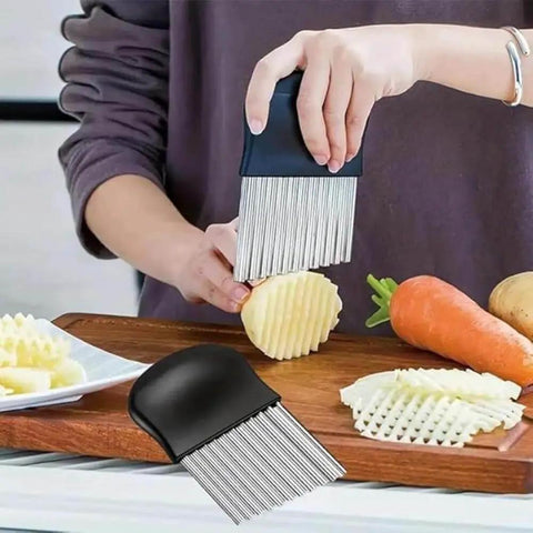 Person using Crinkle Cutter Upgraded Stainless Steel Crinkle Knife For French Fries And Potato Chips Safety Kitchen Tool 1pc Multi Function Vegetable Cutter Perfect Gift For Home Chefs And Snack Lovers to slice potato on cutting board