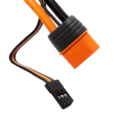 Close-up of Firma 85A Brushless Smart ESC And 3300Kv Sensorless Motor Combo For RC Cars with telemetry cable connectors.