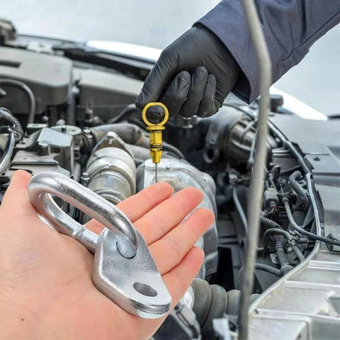Two Piece Heavy Duty Stainless Steel Engine Lifting Rings With 5500 Pound Capacity Hoist Brackets shown beside car engine