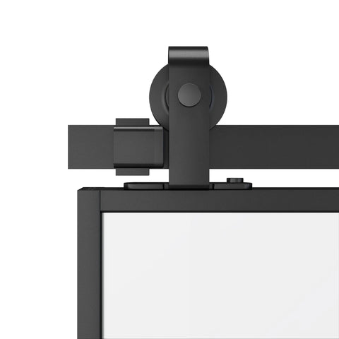 Close-up of top-mounted track and wheel from 6 Ft Sliding Barn Door Hardware Kit with matte black finish for aluminum glass doors.
