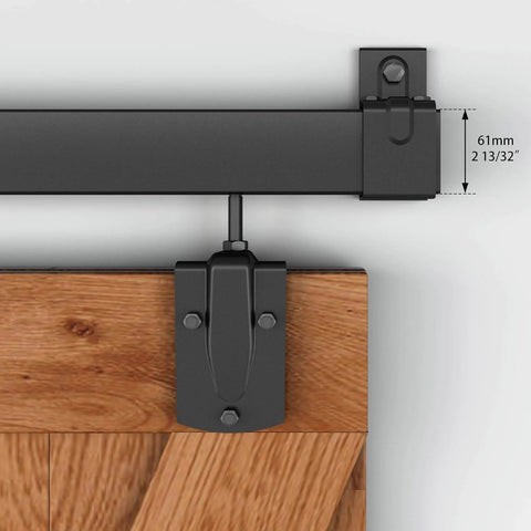 Close-up of 16 Ft Black Box Rail Exterior Barn Door Hardware Track Kit For Two Doors, with bracket and wooden door detail.