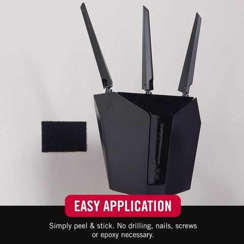 Industrial Strength Hook And Loop Strips With Adhesive 4x2 Inches Holds 10 Lbs, showing strip holding a black device on wall.