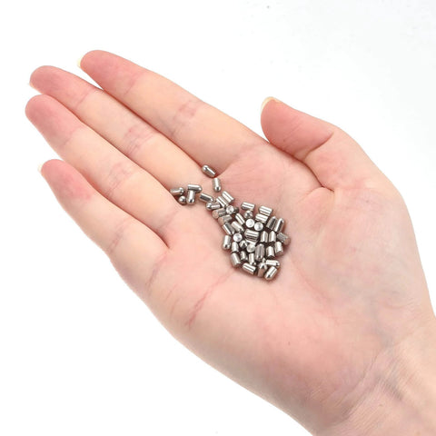 Hand holding 4x6mm Dowel Pins Set Of 10 304 Stainless Steel Round Head Flat Chamfered End Non Threaded Fasteners
