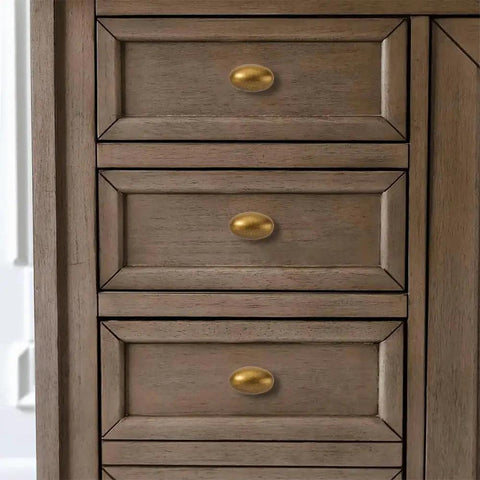 Antique Brass Cabinet Knobs 10 Pack 1-3/8 Inch Oval Drawer Knobs installed on wooden cabinet drawers