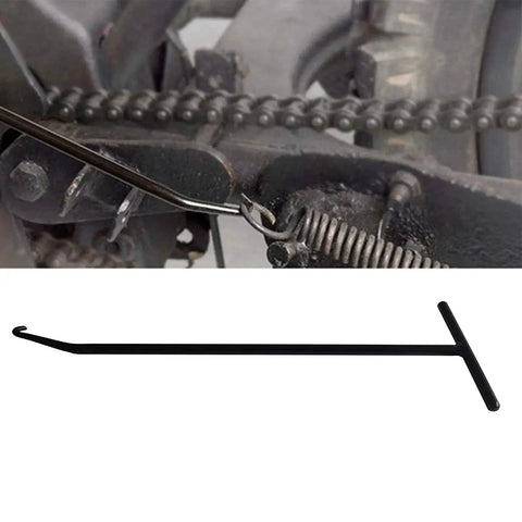 10 Inch Exhaust Spring Puller Tool For Motorcycle Mufflers Snowmobiles And ATVs showing angled hook in use