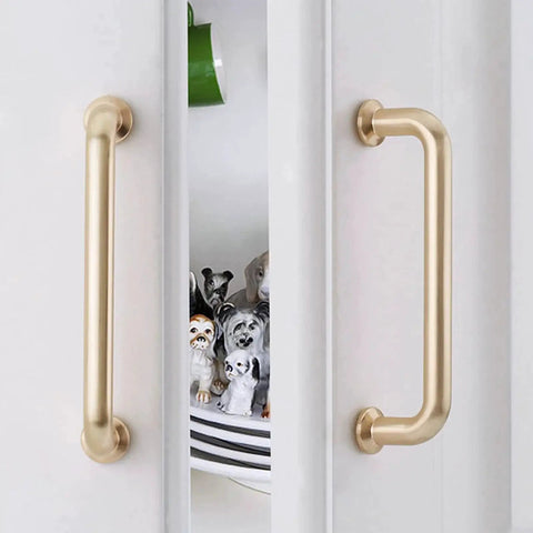 10 Pack 5 Inch Center To Center Brushed Brass Kitchen Cabinet Pulls Zinc Alloy Solid Round Cabinet Handles installed on white doors