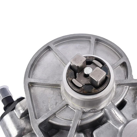 TEKKOAUTO vacuum pump replacement, close-up of silver metal automotive part hub