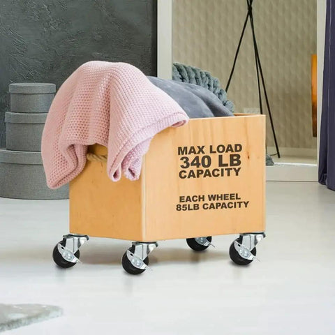 12 Pack 2-Inch Swivel Casters With Brakes for Cart or Equipment, hard rubber wheels, mounted on a wooden crate with blankets