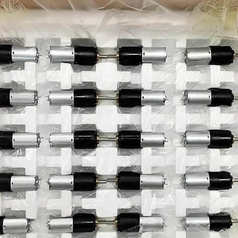 Array of 130 Planetary Gear Reducer with Electronic Starter, DC 12V, 52 RPM Slow Speed, 3 Stage Planetary Gearbox on packing tray