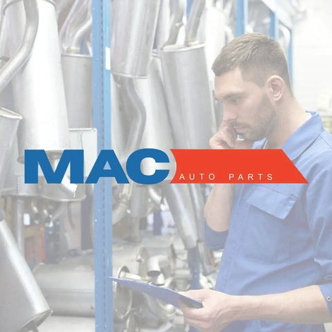 Mechanic inspecting exhaust pipes in warehouse with MAC Auto Parts logo overlay