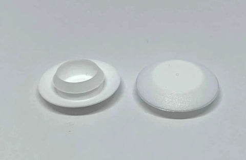 Front view of One Half Inch White Plastic Flush Hole Plugs With Snap In Head For Sheet Metal Holes in low-profile design on white surface.