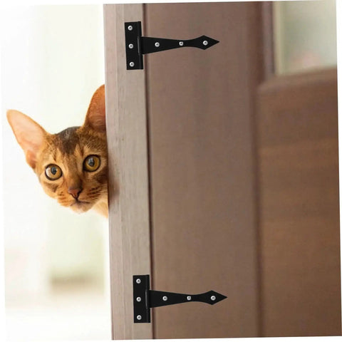 Cat peeking from behind a door with 8 Pack Heavy Duty Iron Door Hinges for Cabinet Replacement with Smooth Surface and High Load Capacity, Residential Door Hardware for Home Use, Built Tough As Nails for Kitchen Cabinets Wardrobes Bathrooms, Outdoor Buildings Like Pet Houses and Barns installed.