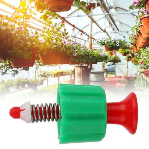Pressure relief valve, 2-pack, green body with red plunger and steel spring for garden backpack sprayers (side view)