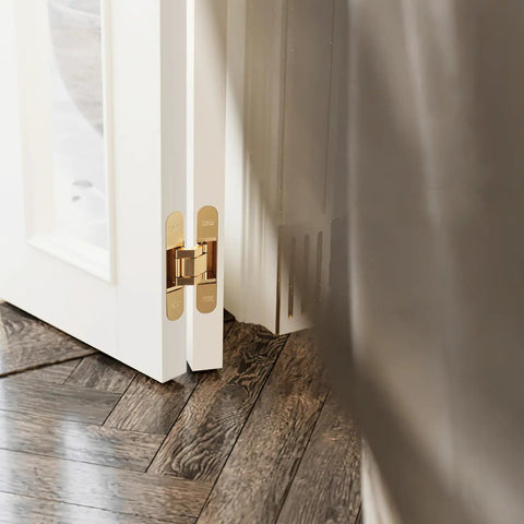 3 Way Adjustable Invisible Door Hinge Concealed Hidden 180 Degree Swing Zinc Alloy Matte Gold Butt Hinge installed on white door