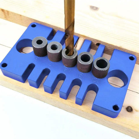 3 In 1 Woodworking Drill Guide And Punch Positioner With Pro Grade Precision Aluminum Alloy Dowel Jig For Cabinet Making And Furniture Assembly Blue 125mm X 70mm X 30mm with drill bit installed