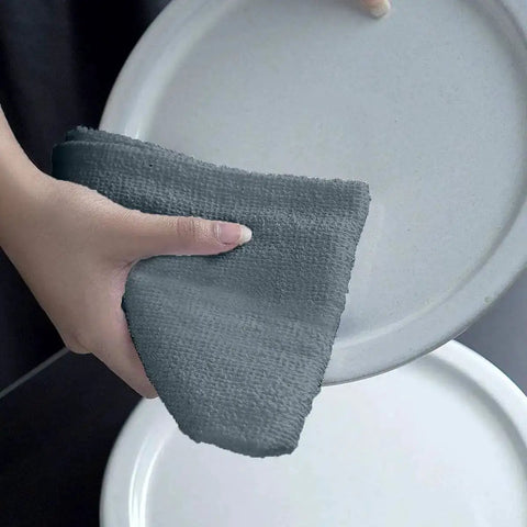 Cleaning a plate with a gray towel from Pack Of 60 14 By 17 Inch Bar Towels For Cleaning 100 Percent Cotton Absorbent And Reusable Multipurpose Terry Cloth Shop Rags Gray Great For Heavy Duty Cleaning Spills And Damp Surfaces In Home Garage And Workshop.
