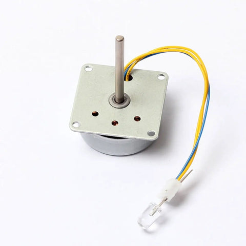 Mini 3 Phase Brushless AC Generator For Hands-On Science, shown with wires and a light bulb attachment, silver metal base.