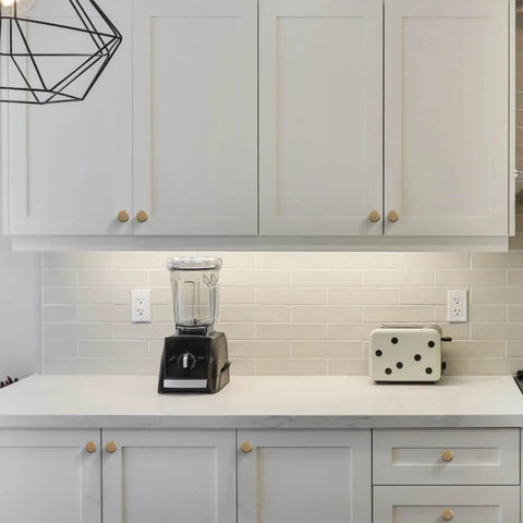 Matte Black And Champagne Bronze Kitchen Cabinet Knobs Set Of 10 For Dresser Drawers Zinc Knobs With Dope Durable Finish And Easy Install Modern Style Hardware For Cabinet Doors And Drawer Fronts. Installed on white kitchen cabinets.