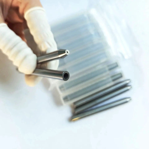 Close-up of Six Piece Set Of Pro Grade Abrasive Waterjet Nozzles And Focusing Tubes For Waterjet Cutting, size 7.14x1.02x76.2 mm.