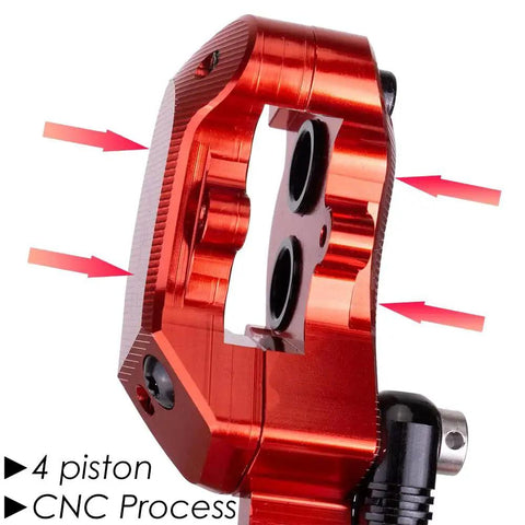 JFOYH red CNC-machined 4-piston MTB hydraulic brake caliper body close-up with mounting holes