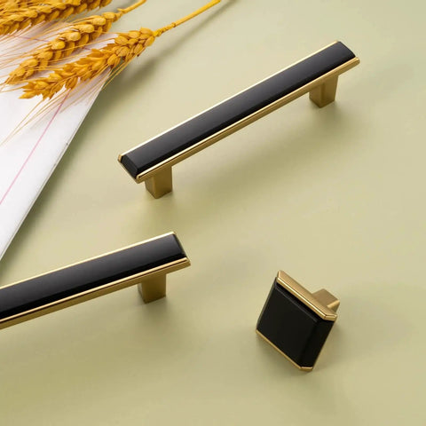 Matte Black and Gold Cabinet Pulls Set, 5 Pack, 5 Inch Center-To-Center Two-Tone Hardware displayed on a light surface