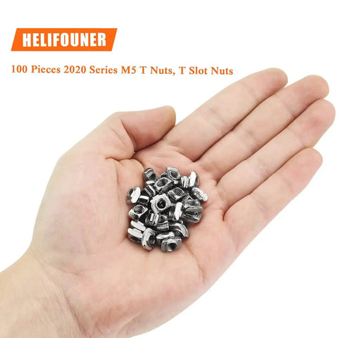 Hand holding 100 Pieces M5 2020 Series T Slot Nuts For Aluminum Profiles Nickel Plated Carbon Steel Heavy Duty Rust Resistant