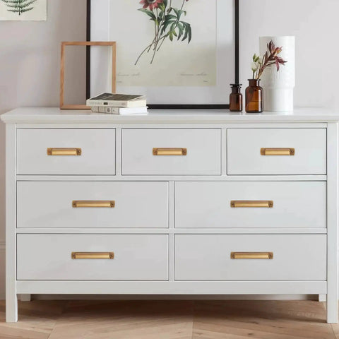 10 Pack 2.5 Inch Antique Brass Cabinet Handles And Cup Pulls Set installed on white dresser drawers