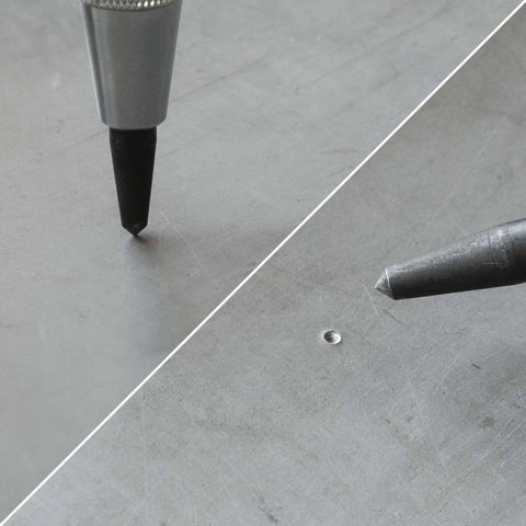 6 Inch Automatic Center Punch With One Handed Spring Impact Chrome Shank And S2 Steel Tip on metal surface close-up