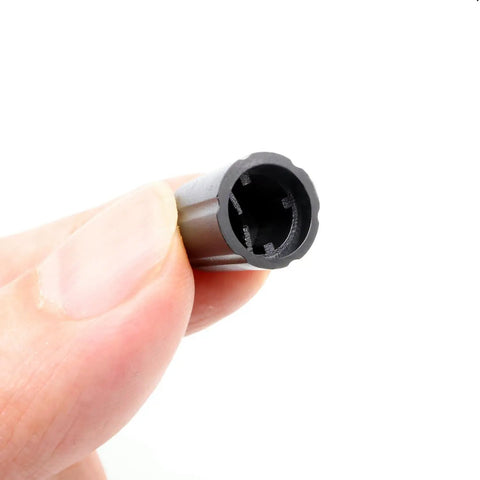 Close-up of black plastic knob from Ten Pack Of 6mm D Type Potentiometer Knobs For Volume Control Black Plastic Knobs For Guitars Encoders DJ Controllers