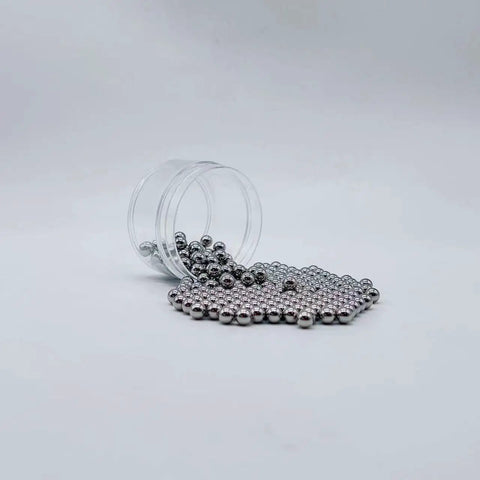 Six Millimeter Stainless Steel Bearing Balls 304 Grade G100 Precision 200 Piece Set for Bearings and Mechanical Projects spilling from container