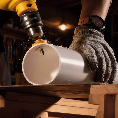 Drill cutting into PVC pipe with Heavy Duty Impact Hole Saw Set for Plumbers 3 Piece Thin Wall Kit, M42 High Speed Steel.