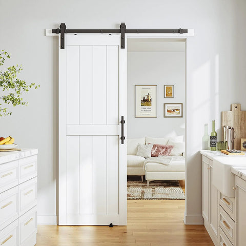 White Sliding Barn Door 30 By 80 Inches Made From MDF With Waterproof PVC Coating Pre Drilled Ready To Assemble Includes 5 Foot Black Sliding Door Hardware Kit And Handle H Frame Built To Last For Smooth Operation installed in a home