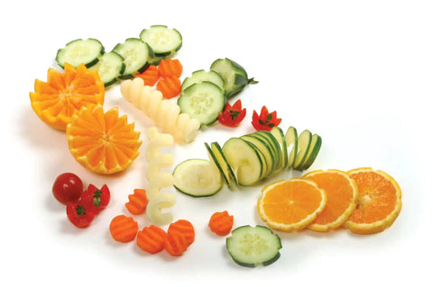 Assorted fruit and vegetable garnishes made using 5 Piece Garnishing Tool Set With Spiral Curl Crinkle And Slice Cutters For Fruit And Veggies Norpro Stainless Steel Kitchen Garnish Tools For Creative Garnishes Easy To Use And Durable Chrome Wire Twin Curl Cutter Included Hand Wash Recommended.