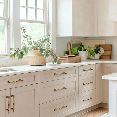 Antique Brass Cabinet Pulls Set Of 6, 7.32 Inch Long With 5.04 Inch Center-To-Center installed on white kitchen drawers.