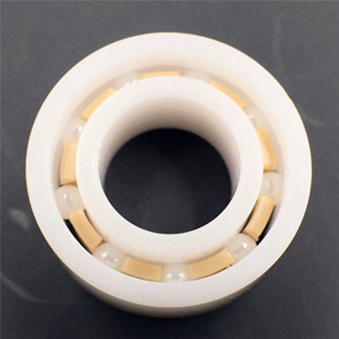 R188 full ceramic ball bearing, white housing with yellow ceramic balls; 1/4 in bore, 1/2 in OD, 3/16 in wide