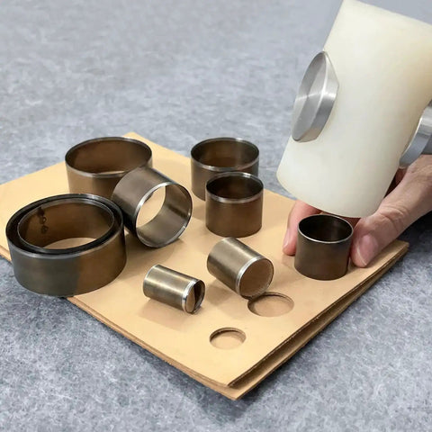 Leather Circle Cutter Set, 7 Piece Circle Punch Tool Kit 20mm To 50mm, shown with high carbon steel cutting dies and hand using tool