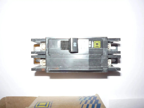 Top view of QOU220 20 Amp 120V And 240V Miniature Circuit Breaker Replacement For Home Electrical Panels showing switches and terminals.