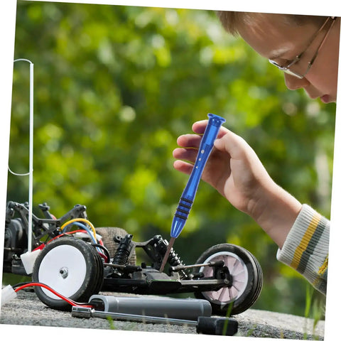 Child using Pro Grade All In One RC Car Repair Tool Set With Assorted Screws Bolts Nuts And Fasteners Kit for maintenance