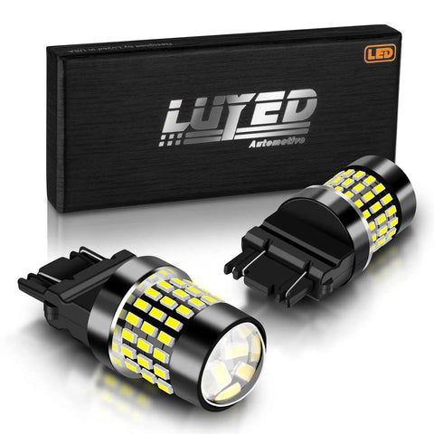 Xenon White 3157 LED Bulbs For Turn Signals Tail Lights And Backup Lights Pack Of 2 1800 Lumens Total 3.6W Each Plug And Play 9 To 30V Non Polarity Projector Style.